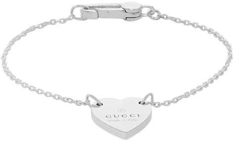 gucci logo silver bracelet|gucci heart bracelet with trademark.